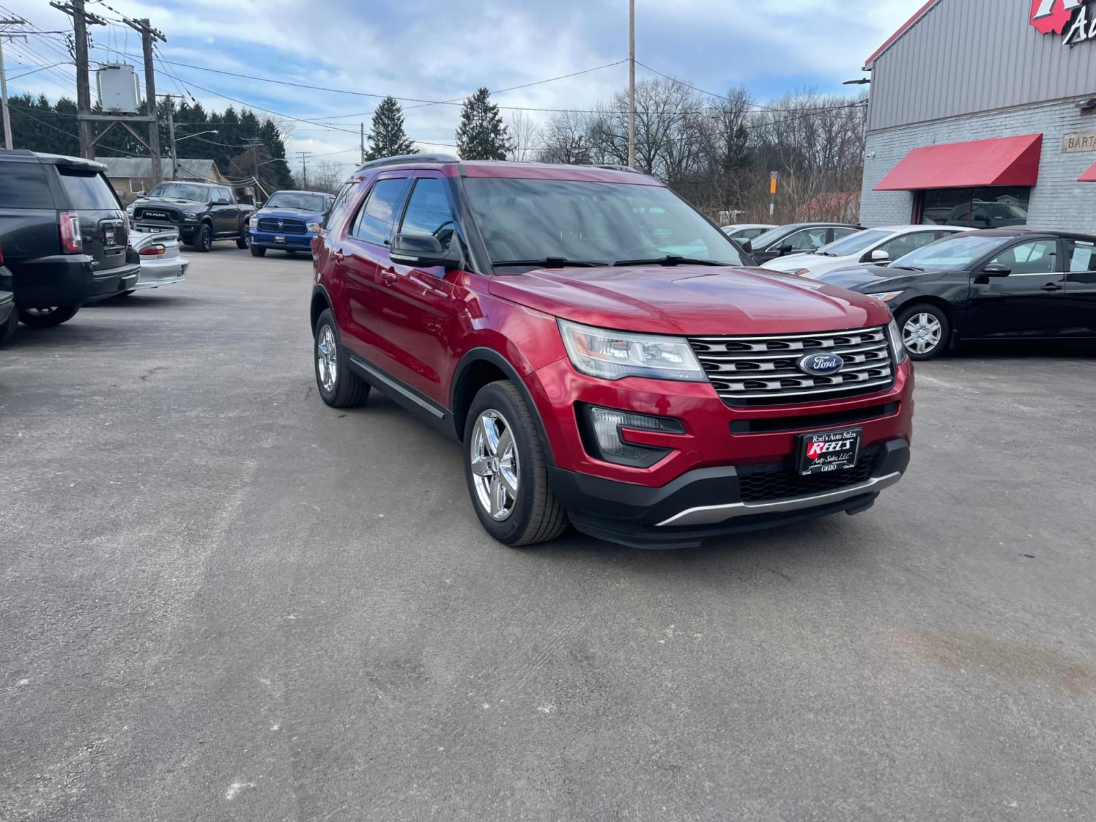 2016 Red /Black Ford Explorer XLT 4WD (1FM5K8D87GG) with an 3.5L V6 DOHC 24V engine, 6 Speed Automatic transmission, located at 547 E. Main St., Orwell, OH, 44076, (440) 437-5893, 41.535435, -80.847855 - This 2016 Ford Explorer XLT 4WD, equipped with a 6-speed automatic transmission and a 3.5-liter V6 engine, stands out with its notable towing capacity of up to 5000 pounds, making it a robust choice for towing and adventure needs. The vehicle enhances visibility and safety with LED daytime running l - Photo #2